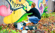Peter Painting the back fence