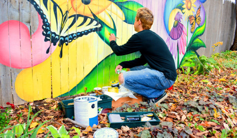 Peter Painting the back fence