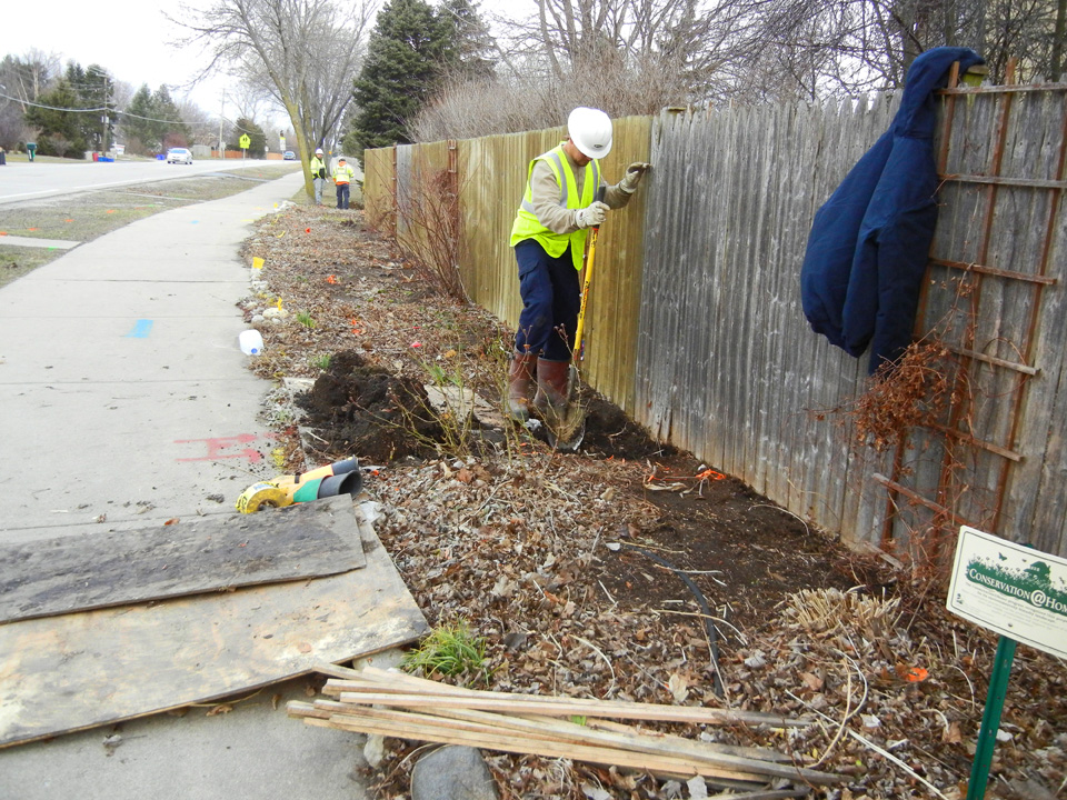 Shawna Coronado's back garden being dug up by the utility company.