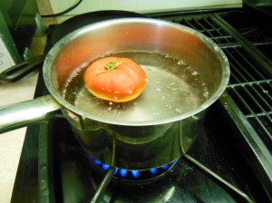 Boiling the skin off a tomato