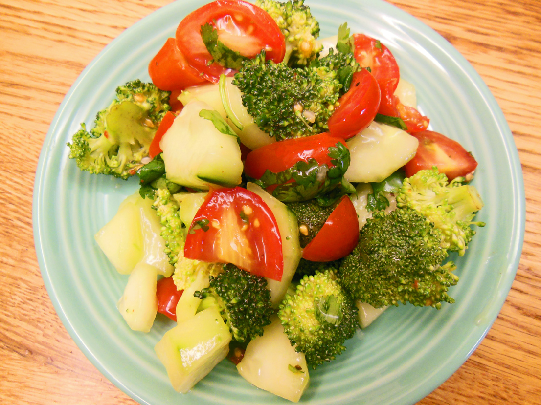 Broccoli tomato cucumber cilantro salad