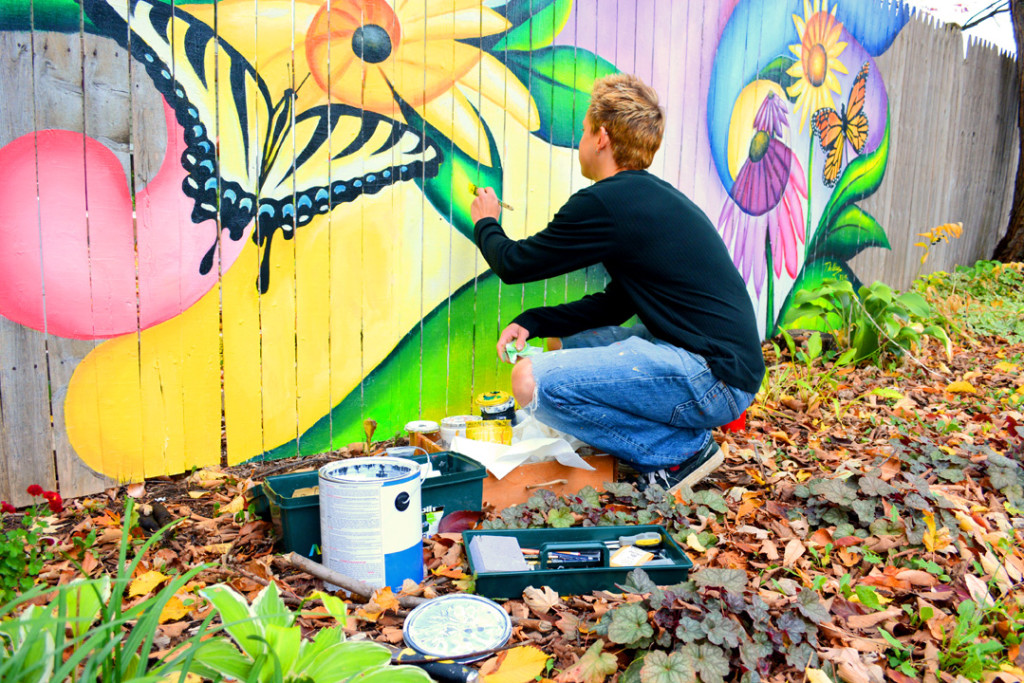 Peter Painting the back fence