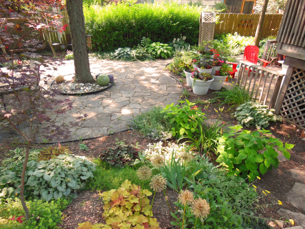 Back Flagstone Circle Garden with Container Towers