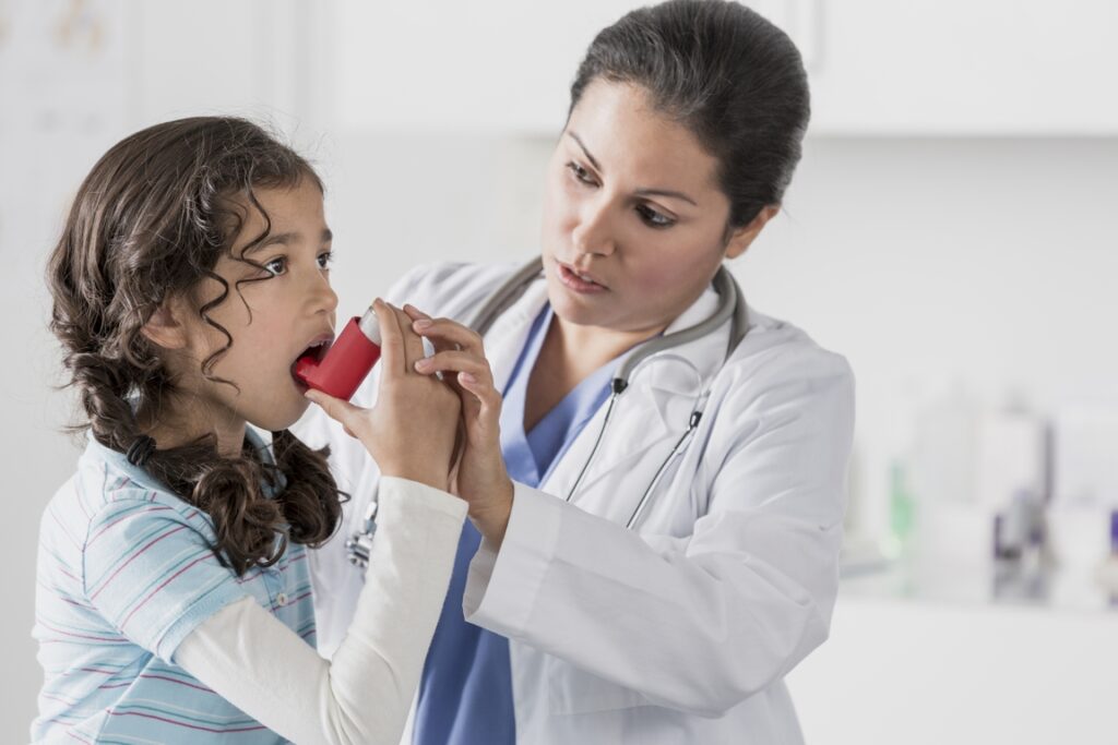 asthma inhaler with doctor and child